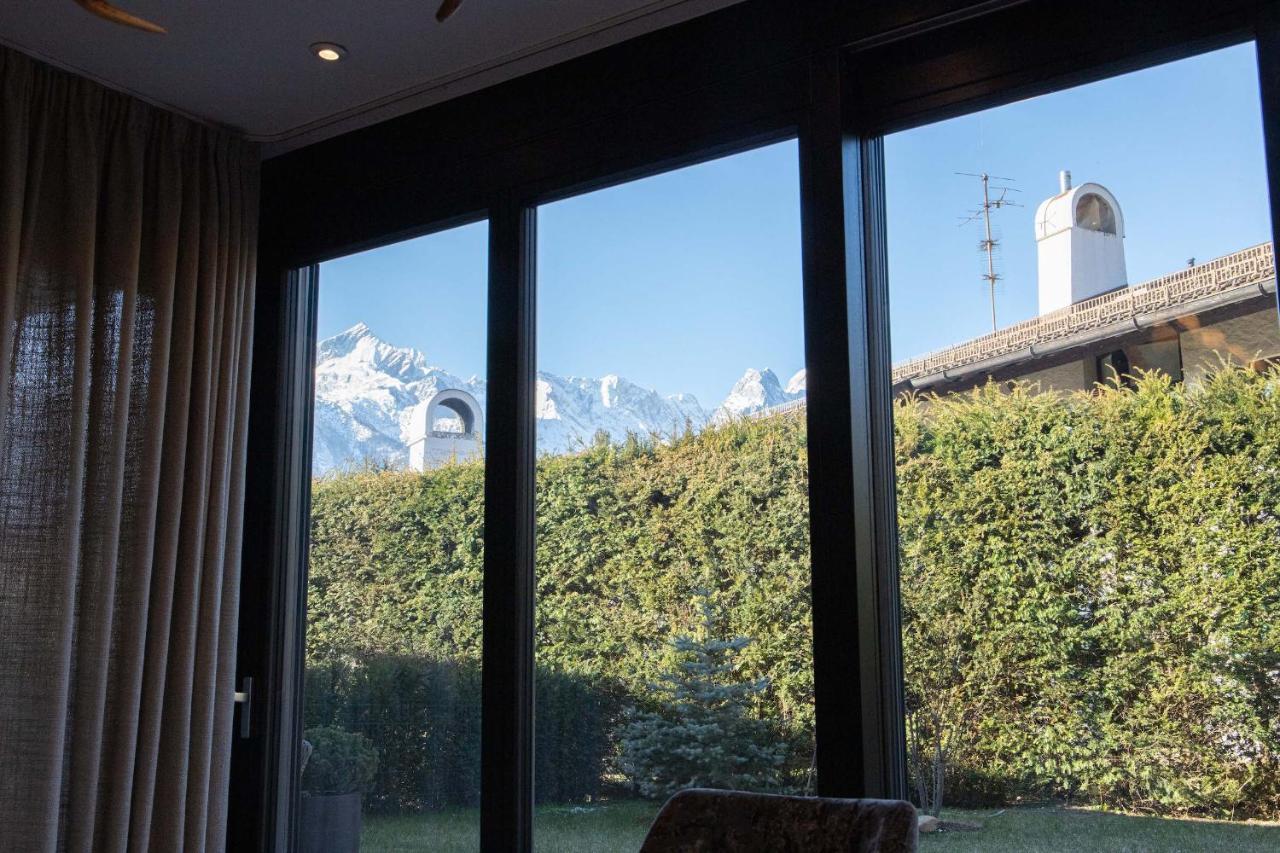 Alpensinfonie Apartment การ์มิช-พาร์เทนเคียร์เชน ภายนอก รูปภาพ